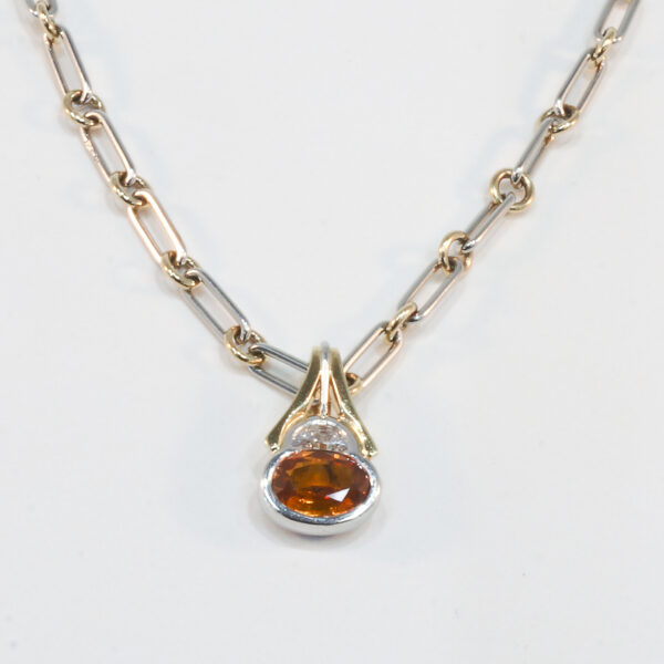 Platinum and 18K Yellow Gold Sapphire and Diamond Pendant